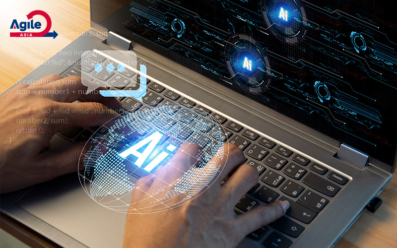 Hands typing on a laptop with AI technology overlay.